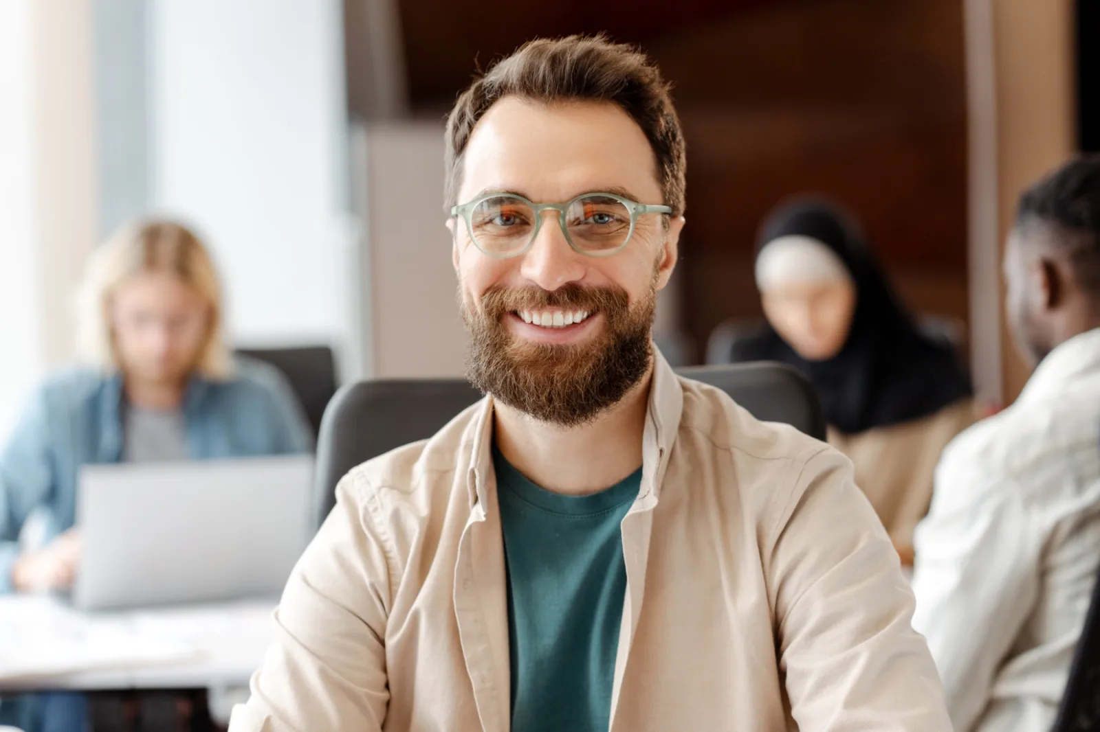 Bearded Businessman Working In Office Looking At C 2026 03 19 07 46 08 Utc