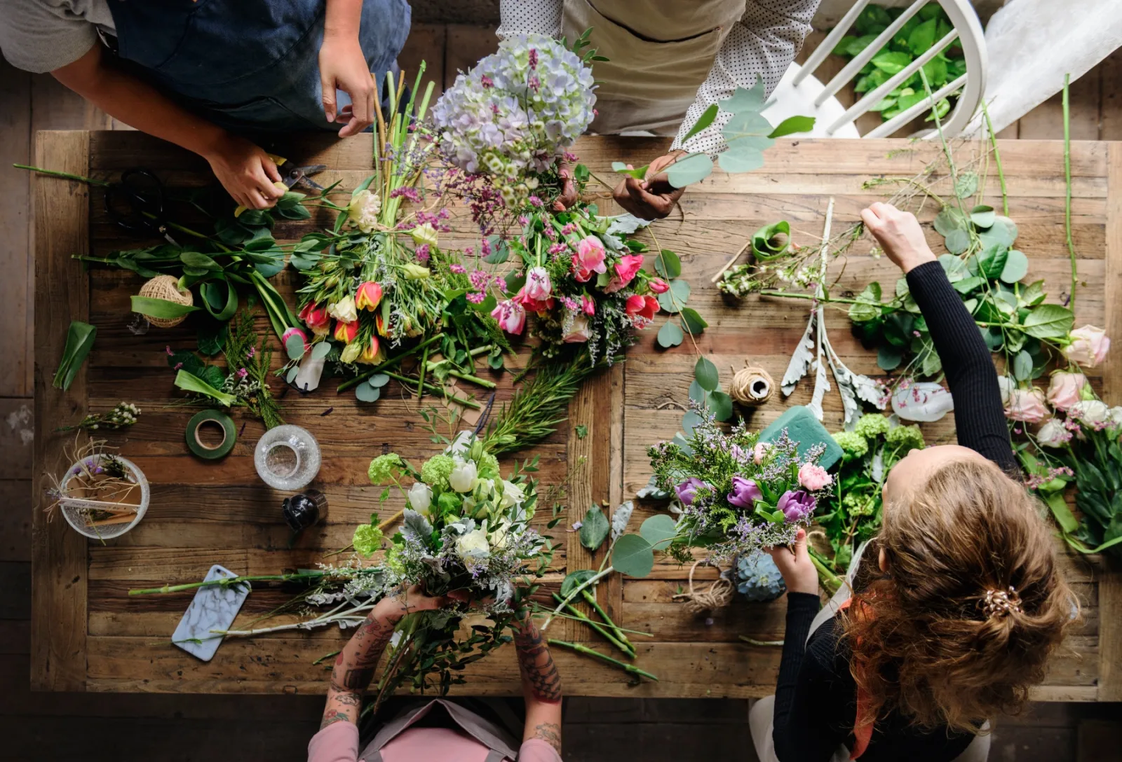 Florists Creating Beautiful Bouquets At Wooden Tab 2026 03 18 10 53 55 Utc