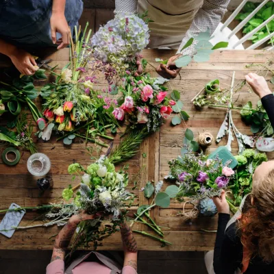 Florists Creating Beautiful Bouquets At Wooden Tab 2026 03 18 10 53 55 Utc