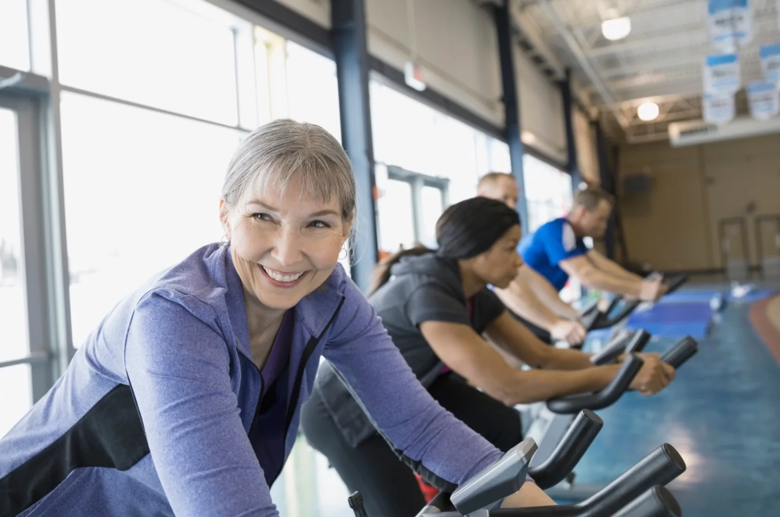 Cheerful People Exercising Together Indoors On Sta 2026 01 11 08 39 53 Utc