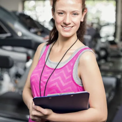 Female Fitness Instructor Standing In Gym In Tank 2026 01 09 11 49 59 Utc