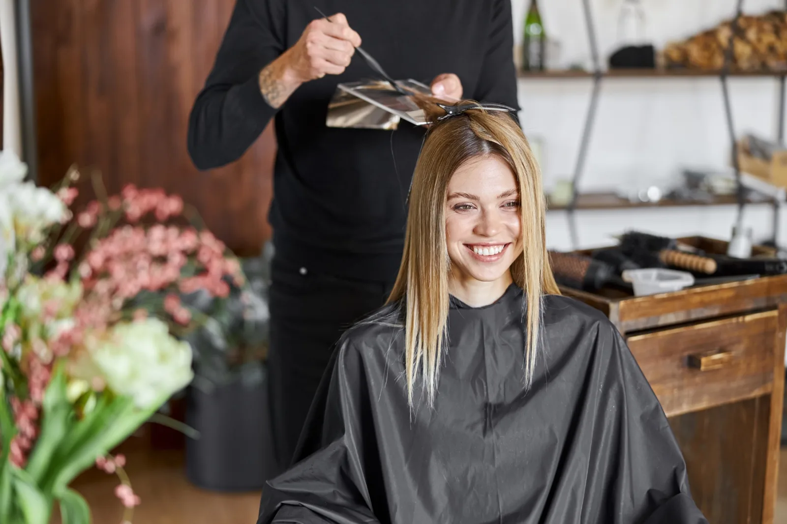 Woman Smiling While Getting Hair Styled In Salon 2026 01 05 06 05 03 Utc