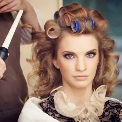 Elegant Woman Getting Hair Styled With Curling Iro 2026 03 17 08 05 25 Utc