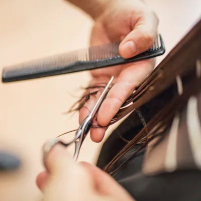 Haircut In Progress With Comb And Scissors 2026 03 10 02 09 29 Utc