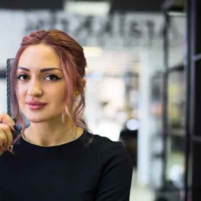 Stylish Woman Holding A Comb In Salon 2026 03 17 06 21 50 Utc