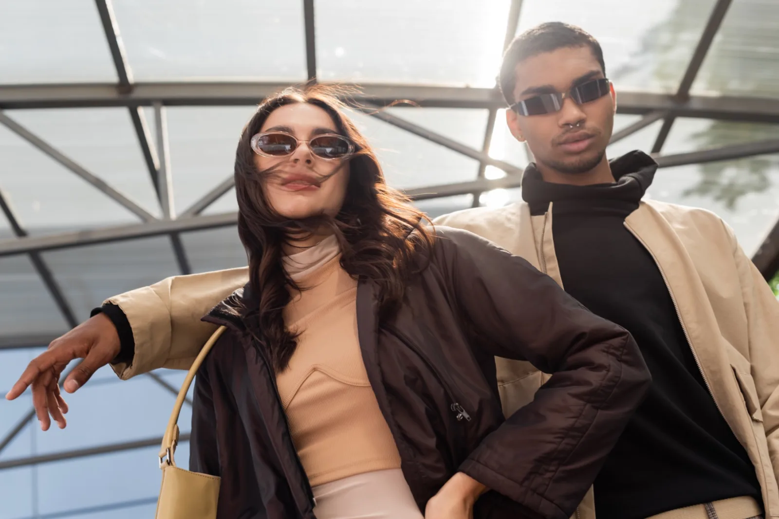 Low Angle View Of Stylish Interracial Couple In Su 2026 03 25 10 54 04 Utc