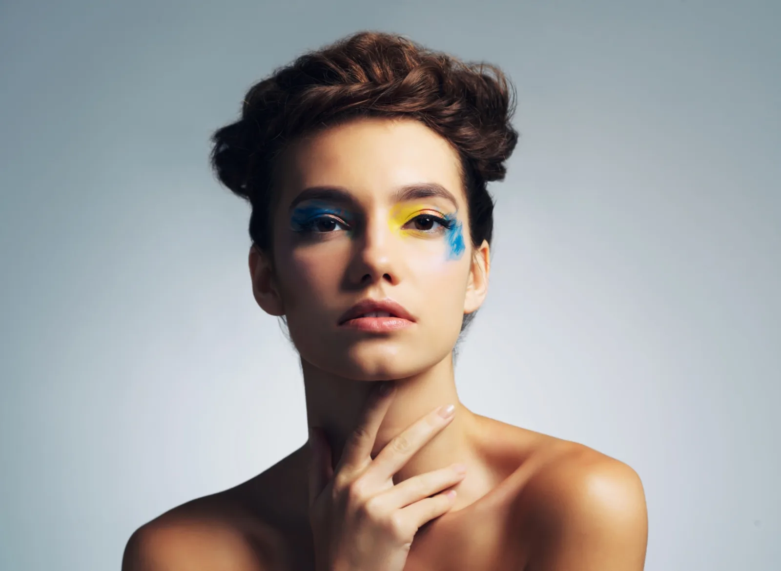 Artistic Woman With Colorful Makeup Against Grey B 2026 01 09 11 31 30 Utc