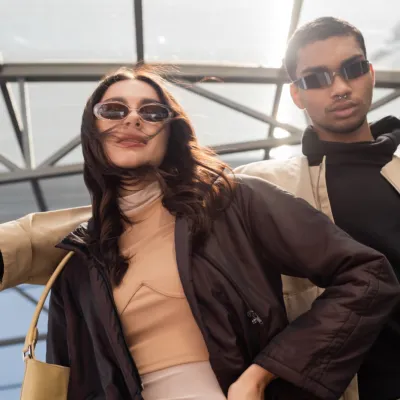 Low Angle View Of Stylish Interracial Couple In Su 2026 03 25 10 54 04 Utc