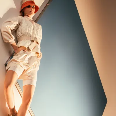 Stylish Woman Posing In Modern Fashion Against Blu 2026 01 06 00 41 03 Utc