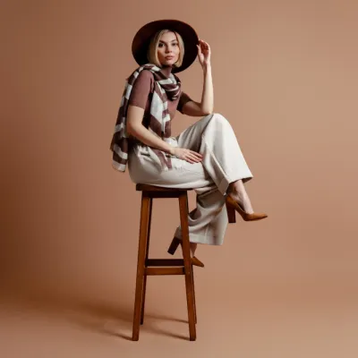 Stylish Woman Sitting On Stool Wearing Hat 2026 01 09 06 38 42 Utc