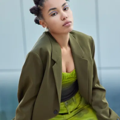 Serious Teenage Girl With Bun Hairstyle Looks Dire 2026 03 26 05 28 39 Utc